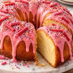 Majestic Giant Artisan Donut Cake with Velvet Vanilla Sponge Mattress, Sticky Apricot Glaze and Blistered Pink Sugar Armor